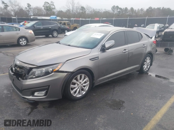 2014 Kia Optima EX z VIN 5XXGN4A75EG290132, wystawiony jako IAAI lot #41292706 z przebiegiem 155 793 mil mil oraz . Historia ofert i sprzedaży dostępna na DreamBid. Obrazek 2.