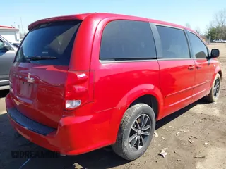 2014 Dodge Grand Caravan SXT with VIN 2C4RDGCG1ER331387, listed as a IAAI auction lot 41810447 with 118,797 mi miles and . Bid and sale history available at DreamBid. Image 4.