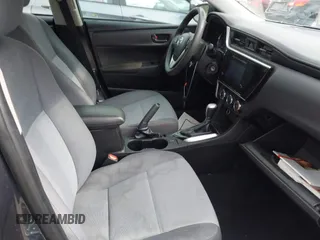 2019 Toyota Corolla L with VIN 5YFBURHE8KP936426, listed as a IAAI auction lot 42029018 with 190,163 mi miles and . Bid and sale history available at DreamBid. Image 5.