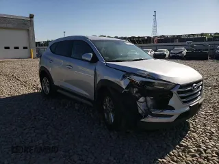 2018 Hyundai Tucson SEL z VIN KM8J3CA4XJU716201, wystawiony jako Copart lot #56790405 z przebiegiem 107 639 mil mil oraz Szkoda całkowita • Salvage title. Historia ofert i sprzedaży dostępna na DreamBid. Obrazek 14.