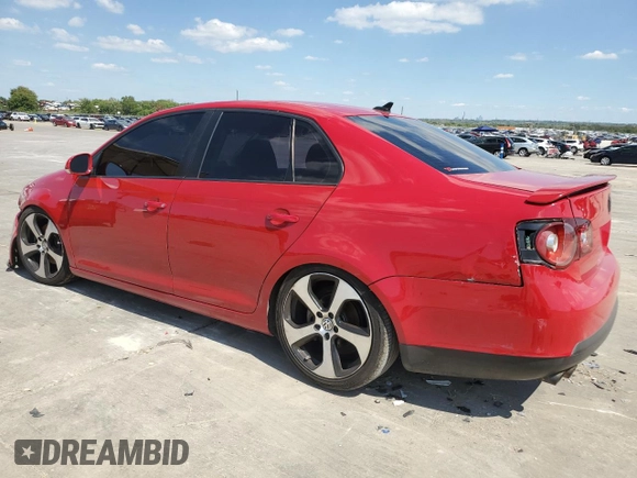 2010 Volkswagen Jetta Wolfsburg Edition with VIN 3VWRJ7AJ6AM069257, listed as a Copart auction lot 73433594 with 184,190 mi miles and Salvage title. Bid and sale history available at DreamBid. Image 2.