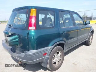 1999 Honda CR-V EX with VIN JHLRD1866XC028200, listed as a IAAI auction lot 42040657 with 207,397 mi miles. Bid and sale history available at carsss.com. Image 4.