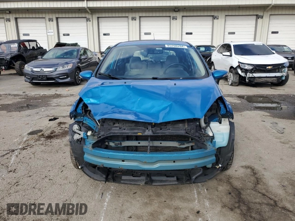 2015 Ford Fiesta Titanium z VIN 3FADP4FJ7FM120958, wystawiony jako Copart lot #85260204 z przebiegiem 144 587 mil mil oraz Szkoda całkowita • Salvage title. Historia ofert i sprzedaży dostępna na DreamBid. Obrazek 5.