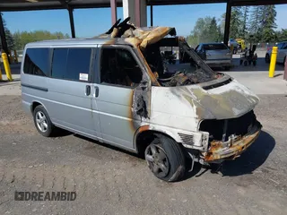 2003 Volkswagen EuroVan MV with VIN WV2MB47073H043489, listed as a IAAI auction lot 42030772 with Not Provided miles and . Bid and sale history available at DreamBid. Image 1.