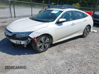 2018 Honda Civic EX-L with VIN 19XFC1F72JE002269, listed as a IAAI auction lot 41973885 with 130,979 mi miles and . Bid and sale history available at DreamBid. Image 18.