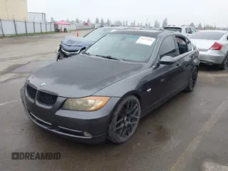 2007 BMW 3 Series 335i with VIN WBAVB73527PA87305, listed as a IAAI auction lot 41277204 with 107,699 mi miles. Bid and sale history available at carsss.com. Image 2.