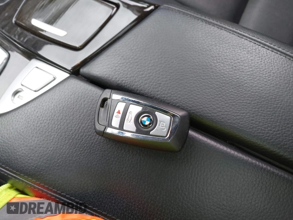 2014 BMW 5 Series 535i with VIN WBA5B1C58EDZ37186, listed as a IAAI auction lot 42040394 with 67,128 mi miles and . Bid and sale history available at DreamBid. Image 11.