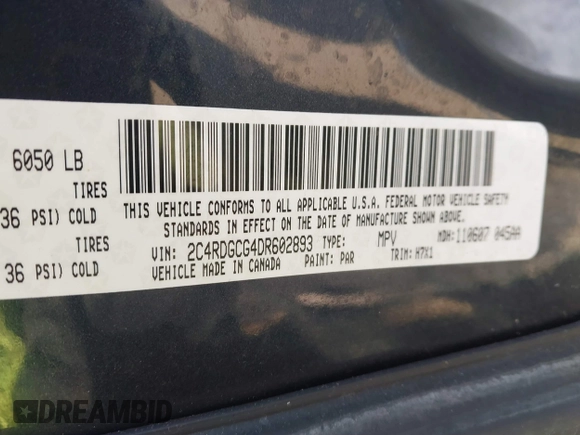 2013 Dodge Grand Caravan SXT with VIN 2C4RDGCG4DR602893, listed as a IAAI auction lot 41747242 with 206,213 mi miles and . Bid and sale history available at DreamBid. Image 9.