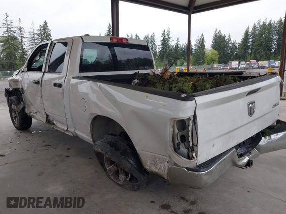 2014 Ram 1500 Tradesman z VIN 1C6RR7FGXES305972, wystawiony jako IAAI lot #42149659 z przebiegiem 163 374 mil mil oraz . Historia ofert i sprzedaży dostępna na DreamBid. Obrazek 3.