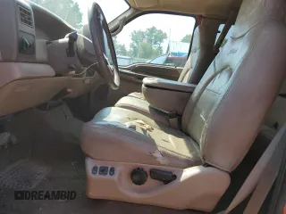1999 Ford F-250 XL with VIN 1FTNX21SXXEE40026, listed as a Copart auction lot 69888634 with 215,535 mi miles and Salvage title. Bid and sale history available at DreamBid. Image 7.