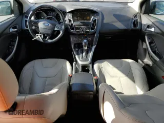 2015 Ford Focus Titanium с VIN 1FADP3J28FL288037, выставлен на аукционе Copart как лот 56972865 с пробегом 75 703 миль миль и Списание • Salvage title. История ставок и продаж доступна на DreamBid. Изображение 8.