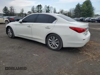 2015 Infiniti Q50 Premium with VIN JN1BV7AR1FM394225, listed as a Copart auction lot 52984735 with 128,305 mi miles and Salvage Title. Bid and sale history available at carsss.com. Image 2.