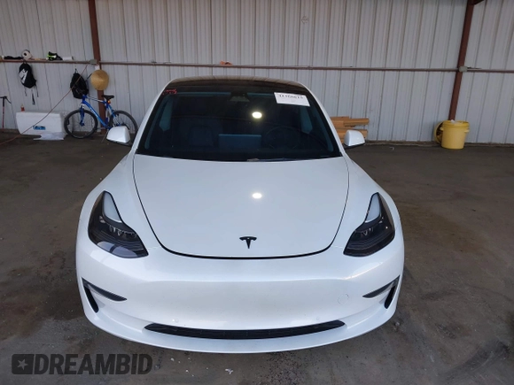 2021 Tesla Model 3 Performance with VIN 5YJ3E1EC4MF097993, listed as a IAAI auction lot 41366615 with 30,735 mi miles and . Bid and sale history available at DreamBid. Image 12.