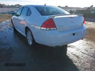 2014 Chevrolet Impala LTZ with VIN 2G1WC5E31E1157669, listed as a IAAI auction lot 41429789 with 122,239 mi miles and . Bid and sale history available at DreamBid. Image 3.