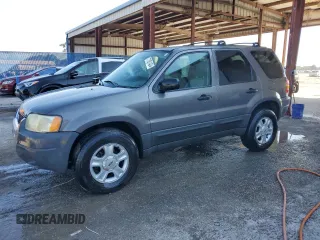 2004 Ford Escape XLT with VIN 1FMYU03154KA96127, listed as a Copart auction lot 71851434 with 168,773 mi miles and Salvage Title. Bid and sale history available at carsss.com. Image 1.