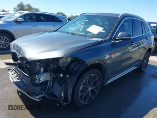 2020 BMW X1 sDrive28i with VIN WBXJG7C0XL3L92799, listed as a IAAI auction lot 41752133 with 92,328 mi miles. Bid and sale history available at carsss.com. Image 2.