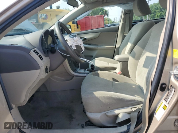2010 Toyota Corolla with VIN 2T1BU4EE1AC496779, listed as a Copart auction lot 62854035 with 158,502 mi miles and Salvage title. Bid and sale history available at DreamBid. Image 7.