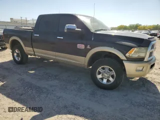 2011 Ram 2500 Laramie Longhorn z VIN 3D7UT2CLXBG604668, wystawiony jako Copart lot #52128635 z przebiegiem 479 971 mil mil oraz Szkoda całkowita • Salvage title. Historia ofert i sprzedaży dostępna na DreamBid. Obrazek 4.