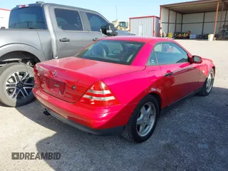 1998 Mercedes-Benz SLK-Class with VIN WDBKK47F7WF058115, listed as a IAAI auction lot 42011747 with 118,423 mi miles. Bid and sale history available at carsss.com. Image 4.
