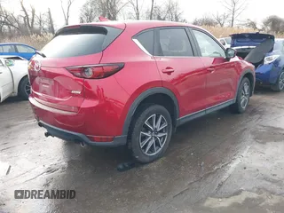 2018 Mazda CX-5 Grand Touring with VIN JM3KFBDM8J0406276, listed as a IAAI auction lot 41447355 with 70,772 mi miles. Bid and sale history available at carsss.com. Image 4.