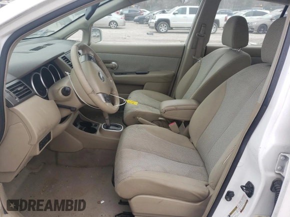 2009 Nissan Versa 1.8 SL with VIN 3N1BC13E69L416683, listed as a Copart auction lot 49011465 with 189,441 mi miles and Salvage Title. Bid and sale history available at carsss.com. Image 7.