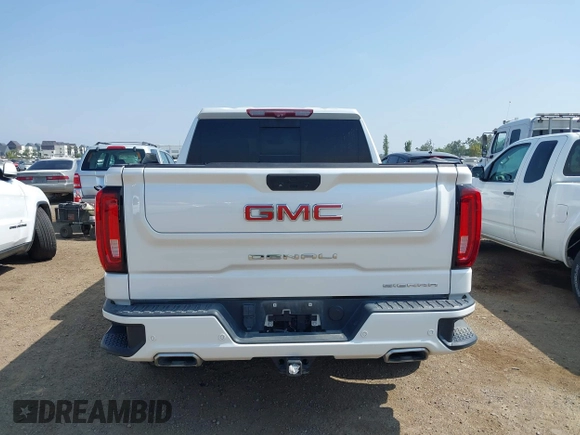 2021 GMC Sierra 1500 Denali z VIN 3GTU9FEL1MG349215, wystawiony jako IAAI lot #42585810 z przebiegiem 97 465 mil mil oraz . Historia ofert i sprzedaży dostępna na DreamBid. Obrazek 16.