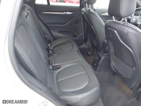 2016 BMW X1 xDrive28i with VIN WBXHT3C3XG5E51358, listed as a IAAI auction lot 41730597 with 90,010 mi miles. Bid and sale history available at carsss.com. Image 8.