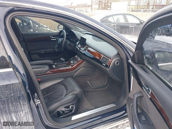 2014 Audi A8 L 4.0T with VIN WAUR2AFD6EN006040, listed as a IAAI auction lot 41408135 with 76,599 mi miles. Bid and sale history available at carsss.com. Image 5.