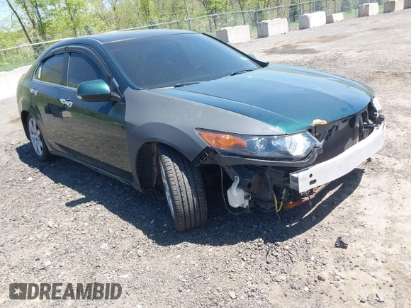 2009 Acura TSX with VIN JH4CU26629C022245, listed as a IAAI auction lot 42154263 with 141,753 mi miles. Bid and sale history available at carsss.com. Image 1.