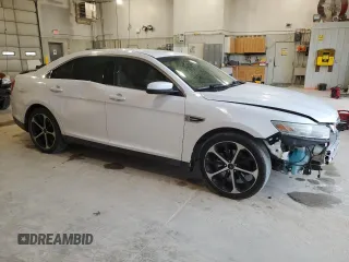 2014 Ford Taurus SEL z VIN 1FAHP2E89EG121025, wystawiony jako Copart lot #55405535 z przebiegiem 168 004 mil mil oraz Czysty tytuł • Clean title. Historia ofert i sprzedaży dostępna na DreamBid. Obrazek 4.