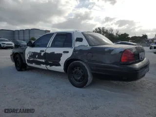 2005 Ford Police Interceptor with VIN 2FAFP71W35X128684, listed as a Copart auction lot 54002165 with 144,766 mi miles and Clean Title. Bid and sale history available at carsss.com. Image 2.