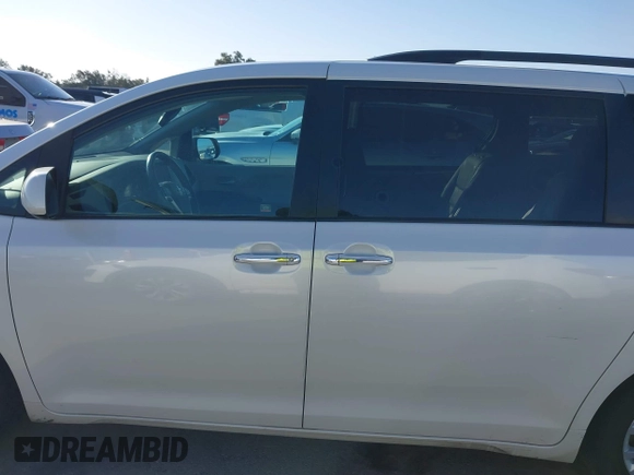 2016 Toyota Sienna XLE with VIN 5TDYK3DC6GS758189, listed as a IAAI auction lot 41598251 with 129,050 mi miles and . Bid and sale history available at DreamBid. Image 14.