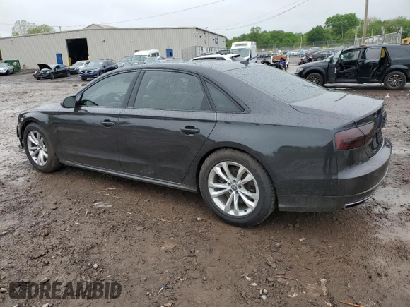2017 Audi A8 z VIN WAU44AFD0HN004258, wystawiony jako Copart lot #55283985 z przebiegiem 128 059 mil mil oraz Szkoda całkowita • Salvage title. Historia ofert i sprzedaży dostępna na DreamBid. Obrazek 2.