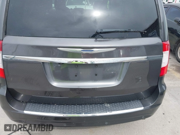 2014 Chrysler Town & Country Touring L with VIN 2C4RC1CG7ER300693, listed as a IAAI auction lot 41849463 with 174,203 mi miles and . Bid and sale history available at carsss.com. Image 18.