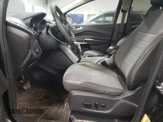 2015 Ford Escape SE with VIN 1FMCU0GX4FUC57258, listed as a Copart auction lot 51085685 with 216,724 mi miles and Salvage Title. Bid and sale history available at DreamBid. Image 7.