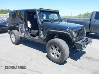 2014 Jeep Wrangler Unlimited Sport with VIN 1C4HJWDG5EL268736, listed as a IAAI auction lot 42051489 with 150,864 mi miles and . Bid and sale history available at DreamBid. Image 1.