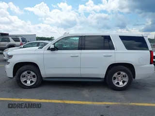 2015 Chevrolet Tahoe Commercial z VIN 1GNLC2EC1FR721538, wystawiony jako IAAI lot #42274601 z przebiegiem 138 991 mil mil oraz . Historia ofert i sprzedaży dostępna na DreamBid. Obrazek 14.