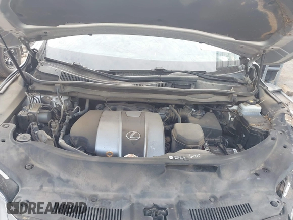 2019 Lexus RX with VIN 2T2ZZMCA3KC135292, listed as a IAAI auction lot 41573153 with 106,971 mi miles. Bid and sale history available at carsss.com. Image 10.