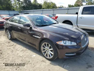 2013 Jaguar XJ z VIN SAJWA1C75D8V54004, wystawiony jako Copart lot #76922464 z przebiegiem 107 175 mil mil oraz Szkoda całkowita • Salvage title. Historia ofert i sprzedaży dostępna na DreamBid. Obrazek 4.