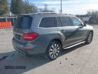 2018 Mercedes-Benz GLS with VIN 4JGDF6EE7JB098694, listed as a IAAI auction lot 41294697 with 104,807 mi miles. Bid and sale history available at carsss.com. Image 4.