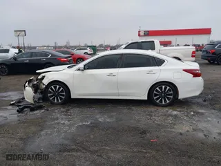 2018 Nissan Altima 2.5 SV with VIN 1N4AL3AP5JC216408, listed as a IAAI auction lot 41481988 with 216,407 mi miles. Bid and sale history available at carsss.com. Image 14.