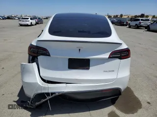 2022 Tesla Model Y Performance z VIN 7SAYGDEF6NF397082, wystawiony jako Copart lot #55823435 z przebiegiem Nie podano mil oraz Szkoda całkowita • Salvage title. Historia ofert i sprzedaży dostępna na DreamBid. Obrazek 6.