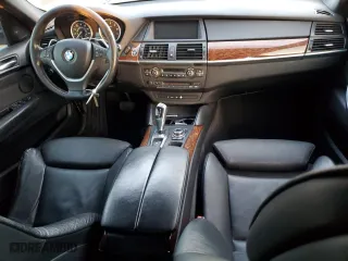 2012 BMW X6 50i with VIN 5UXFG8C52CLZ97127, listed as a Copart auction lot 87689165 with 169,379 mi miles and Salvage Title. Bid and sale history available at carsss.com. Image 8.