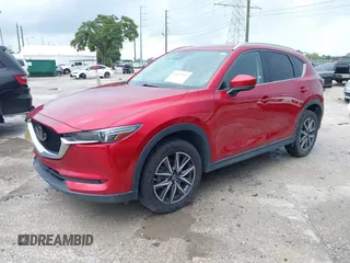 2018 Mazda CX-5 Grand Touring with VIN JM3KFADM5J0437365, listed as a IAAI auction lot 42657919 with 96,760 mi miles and . Bid and sale history available at DreamBid. Image 17.