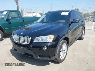 2013 BMW X3 xDrive28i with VIN 5UXWX9C5XD0A27165, listed as a IAAI auction lot 42052413 with 104,926 mi miles and . Bid and sale history available at DreamBid. Image 2.