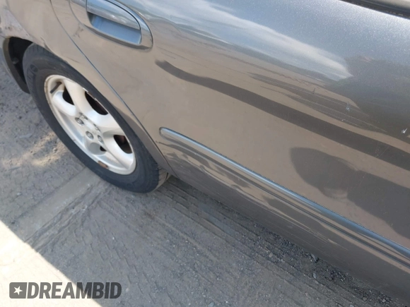 2003 Ford Taurus SE Standard with VIN 1FAFP53U93G221714, listed as a IAAI auction lot 42636704 with 150,804 mi miles and . Bid and sale history available at DreamBid. Image 6.