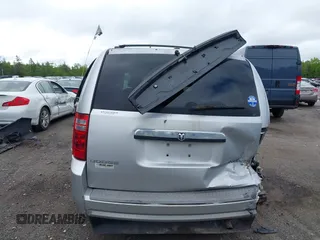 2009 Dodge Grand Caravan SXT z VIN 2D8HN54139R615585, wystawiony jako IAAI lot #42334638 z przebiegiem 129 672 mil mil oraz . Historia ofert i sprzedaży dostępna na DreamBid. Obrazek 12.