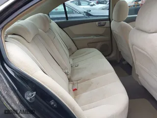 2007 Kia Optima LX with VIN KNAGE124975133923, listed as a IAAI auction lot 42007990 with 87,768 mi miles. Bid and sale history available at carsss.com. Image 8.