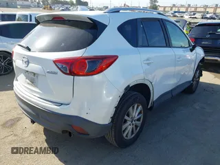 2013 Mazda CX-5 Sport with VIN JM3KE2BE4D0153251, listed as a IAAI auction lot 42297235 with 177,019 mi miles and . Bid and sale history available at DreamBid. Image 4.
