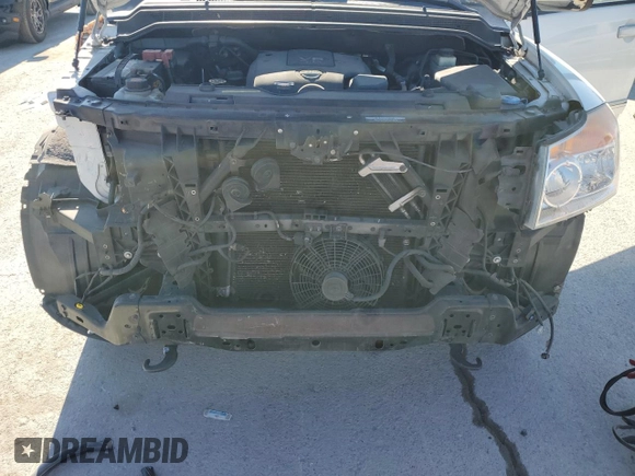 2015 Nissan Armada Platinum z VIN 5N1BA0NE1FN621958, wystawiony jako Copart lot #88787805 z przebiegiem 132 873 mil mil oraz Szkoda całkowita • Salvage title. Historia ofert i sprzedaży dostępna na DreamBid. Obrazek 13.